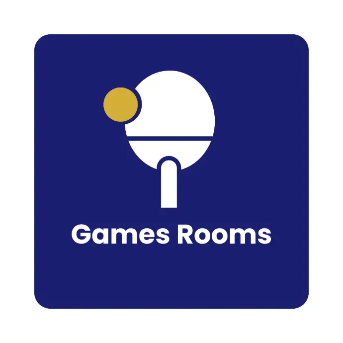 Students playing table tennis in the recreation room