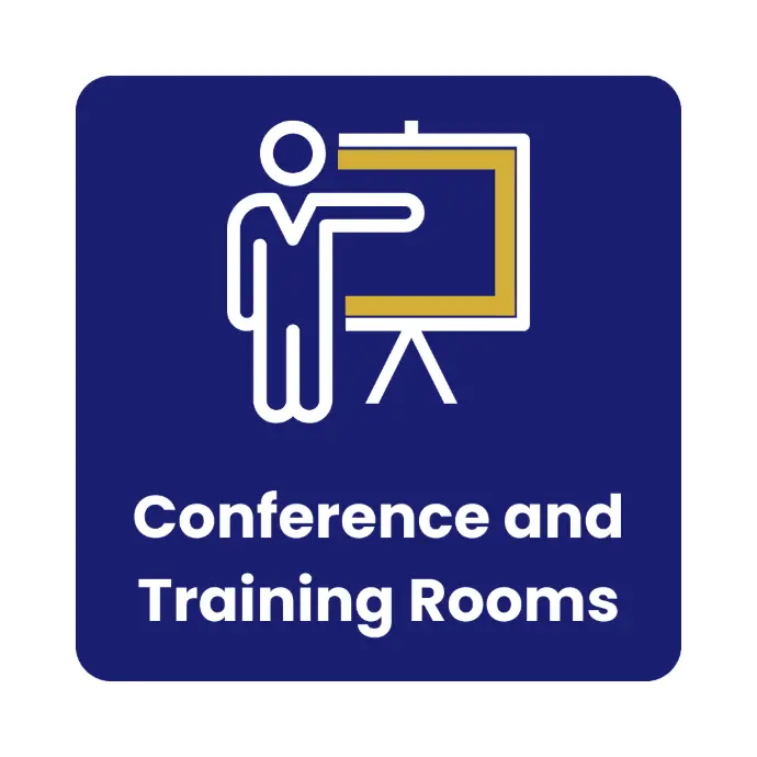 Modern conference room with presentation screen, seating, and workspace at Burgers Park Student Hotel